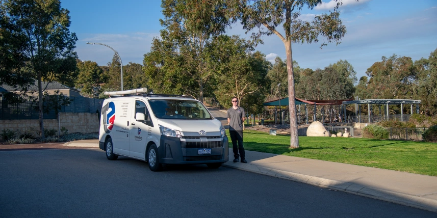Ashley Townend with his Townend Plumbing & Gas van at Sherlock Park in Jane Brook after completeing a job.