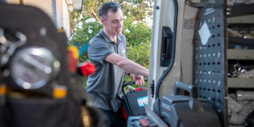 Ashley Townend, owner operator, unloading equipment from his service van