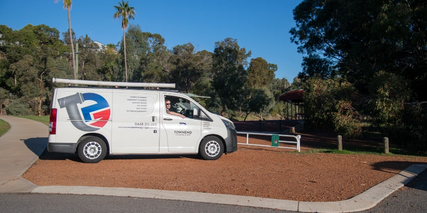 Ashley Townend's in the Townend Plumbing & Gas van stopped near Swan View Station, taking an emergany call.